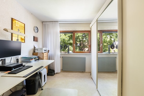 Foto - Te koop: Goed onderhouden tussenwoning in rustige woonwijk!